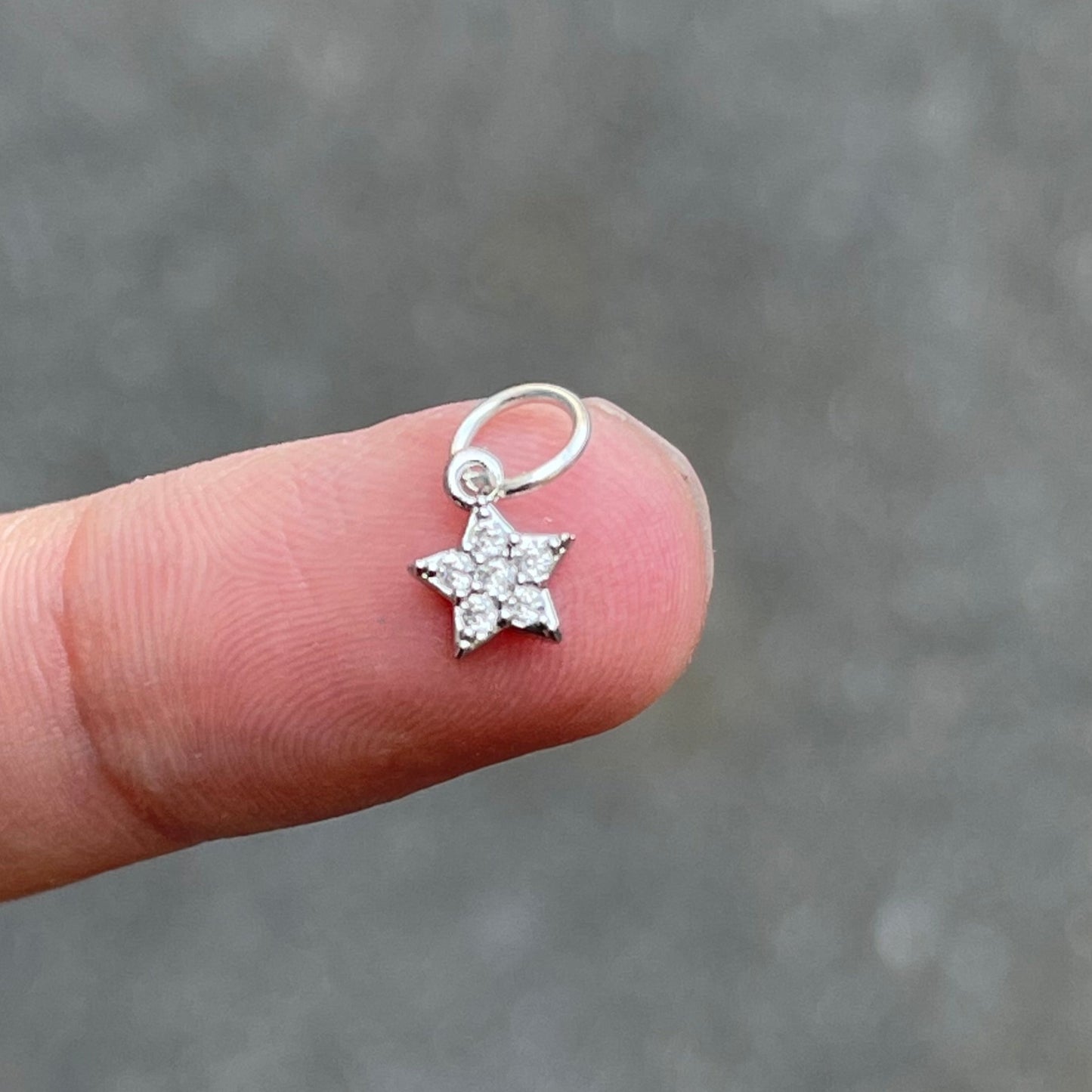 Nail Pierces Charm