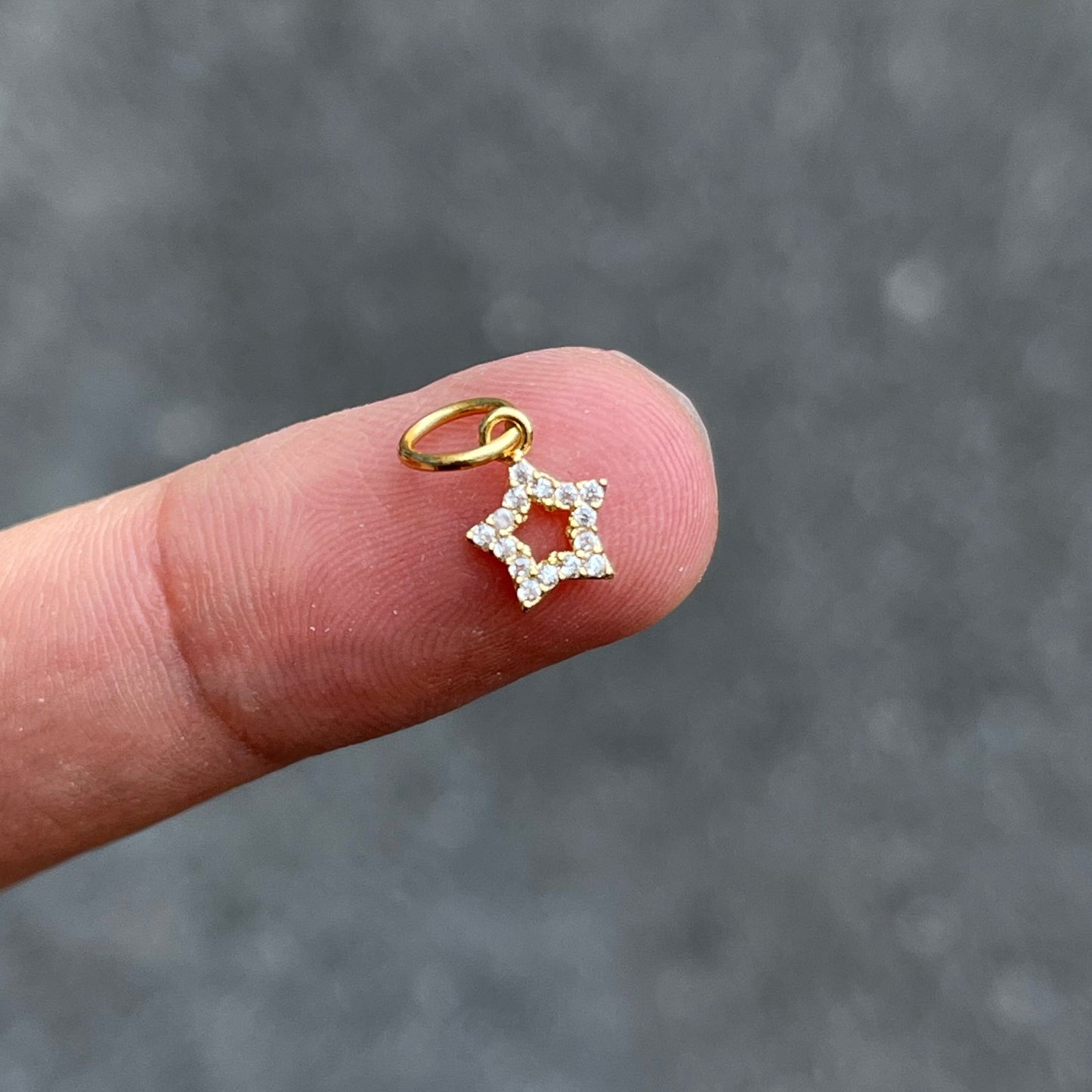 Nail Pierces Charm
